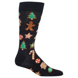 A single black crew sock with a festive Christmas gingerbread pattern, featuring illustrations of a gingerbread man, decorated trees, candy canes, stars, and houses in brown, green, and red, shown against a plain white background.