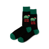 Black socks with turtle design and 'Slow Ho Ho' text on a transparent background