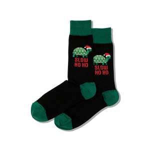Black socks with turtle design and 'Slow Ho Ho' text on a transparent background