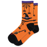 A pair of orange crew socks with a Halloween theme, featuring black heels, toes, and cuffs, decorated with a witch's hat, broomstick, spiderwebs, and spiders.