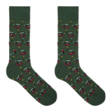 A pair of dark green crew socks with an all-over golf course pattern featuring red and white golf carts, golf balls, flags, and a golfer, displayed against a solid white background. thumbnail
