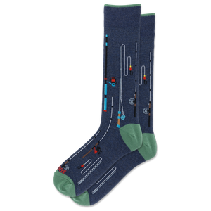 A pair of crew socks in heathered navy blue with a fishing rod and line pattern, featuring sage green heels and toes, displayed on a clean white background.