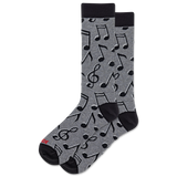 A pair of crew socks with a gray heather body patterned with black musical notes and clefs, featuring solid black heels, toes, and cuffs. A small red logo is visible on the toe.