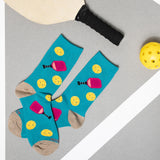 Pair of blue socks with colorful designs on a gray surface