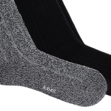 Two knit knee high socks from K-Belt, one in a heathered gray and white marled knit and one in solid black, shown overlapping on a white background.
