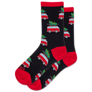 Black socks with red accents and Christmas-themed vehicle and tree pattern on a white background