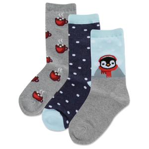 Set of three socks with different designs on a white background